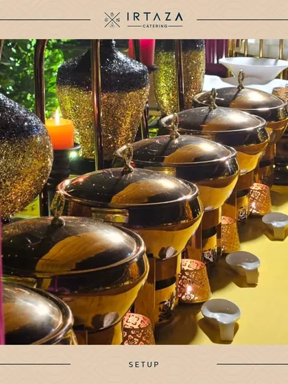 Another angle of the black and gold theme, showing the beautiful contrast against a bright yellow tablecloth. This demonstrates my ability to adapt my setups to different color palettes and event styles.