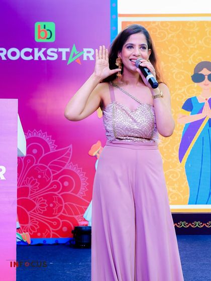 On stage at the Big Basket event, encouraging the audience to join in.