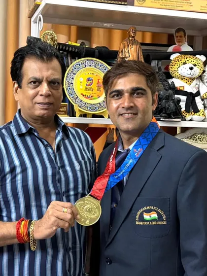 Congratulating a CRPF karate team player at my office for his gold medal performance at the World Police & Fire Games. Our affiliated teams consistently achieve success.