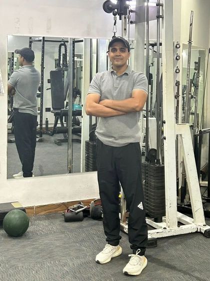 A confident pose in the gym. I believe in the training I provide because I follow it myself.