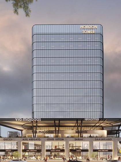 Clean lines, geometric shapes, and a focus on natural light define the architectural language of Horizon Tower. The rounded corners of the glass facade give it a soft yet imposing presence on the skyline.