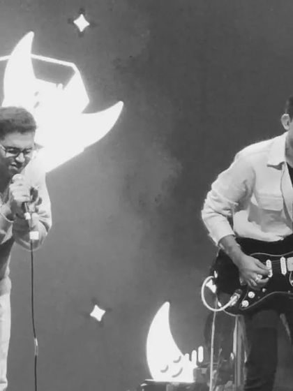 A black and white throwback to a show in Bangalore. The focus here is on the musical interaction between me and my guitarist, a key part of our live dynamic.