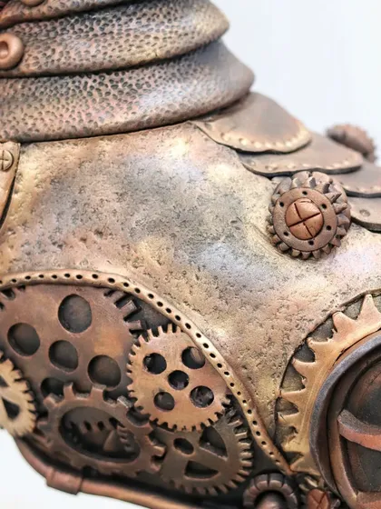 A macro shot of the textured body of the Steampunk Horse, showing the hand-painted metallic finish and layered gears that give it an authentic steampunk look.