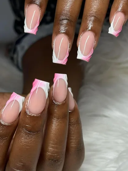 A modern French manicure with a textured, abstract pink and white tip. This is a creative and artistic take on a classic.