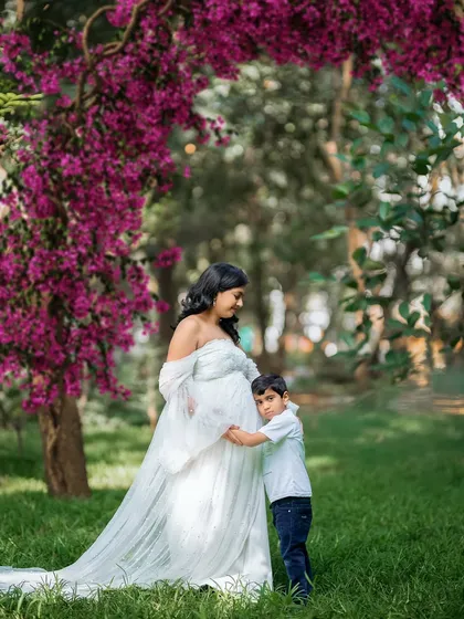 Motherhood is a journey of growing love. Including your first child in the photoshoot is a beautiful way to capture the family's excitement as you wait to welcome a new member. These are the moments they will cherish forever.