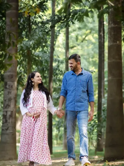 An expecting couple enjoying a walk through the woods during their maternity shoot. I love capturing the anticipation and connection between partners before their little one arrives.