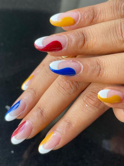 Primary colors for a primary vibe. This abstract design uses negative space with bold waves of red, yellow, blue, and white for a modern art feel.