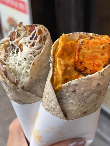 My rolls are made on coals for that authentic smoky flavour. This picture shows my Paneer Tikka Roll and a cheesy roll, both equally delicious.