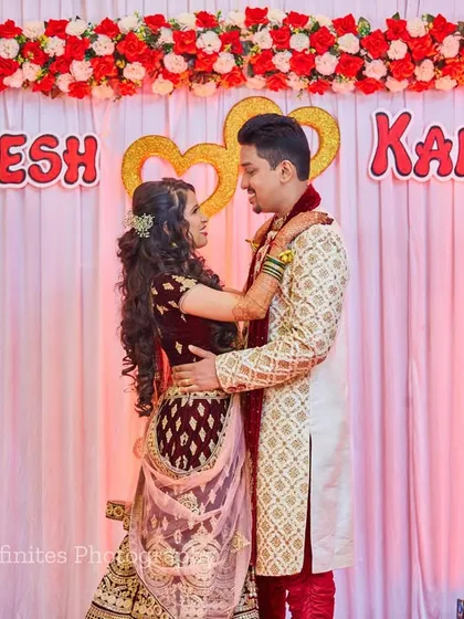 I always make sure to get a great shot of the couple with any personalized decor, like this custom name backdrop for their engagement.