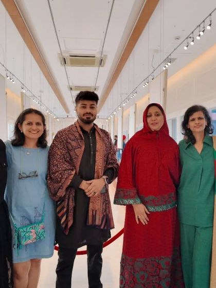 A group photo of all the talented artists featured in a collaborative show.