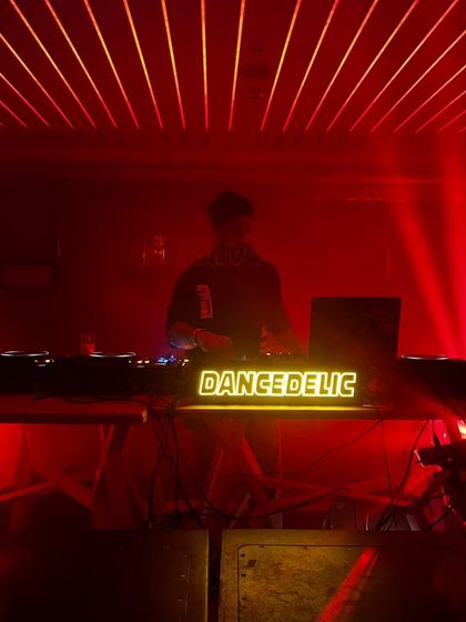 A moment behind the decks at Dirt Candy, getting ready to drop the next track for the Dancedelic crew. The energy was building all night.
