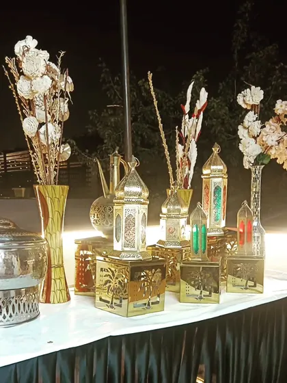 Beautiful table decor is part of the package. My team ensures that every corner of the buffet setup is aesthetically pleasing, using elements like these Moroccan lanterns.