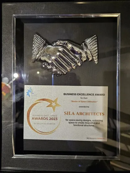 A close-up of the Business Excellence Award 2023. This motivates us to continue pushing the boundaries of design and delivering the best for our clients.