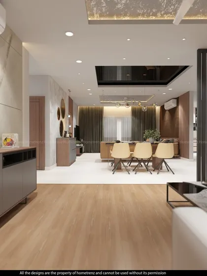 This view shows the seamless connection between the drawing room, dining area, and kitchen. The consistent color palette and flooring create a cohesive and expansive feel.