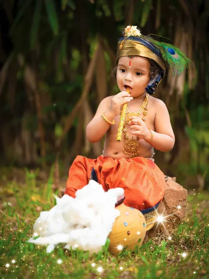 Celebrating our traditions is so special. Here, a little one dressed as Krishna enjoys a playful moment in the park. I offer a variety of cultural themes that can be shot either in my studio or outdoors.