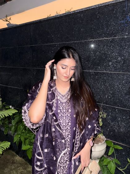 A candid moment, adjusting my hair, in the beautiful Diwali outfit.