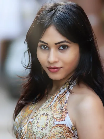A stunning close-up that captures her beautiful features and direct, engaging gaze.