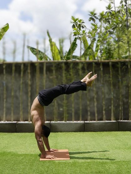 The hollow back handstand, or Mexican handstand, is a beautiful shape that requires a good mix of shoulder mobility and balance. This was taken during my training trip to Bali.