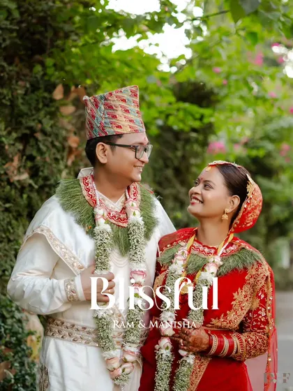 "Blissful." A beautiful outdoor portrait of the newly married couple in their traditional Nepalese wedding attire.