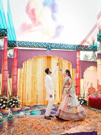 We love getting creative with our shots. Using colored smoke against a vibrant Haldi backdrop, we craft a dynamic and visually stunning portrait that feels both modern and celebratory.