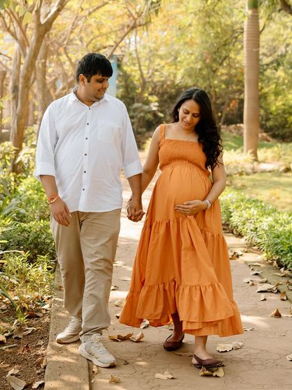 A walk in the park, hand in hand, with a shared dream. The simple moments are often the most precious ones to capture.