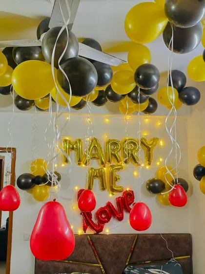 A candid shot during the 'Marry Me' proposal setup, capturing the moment of surprise.