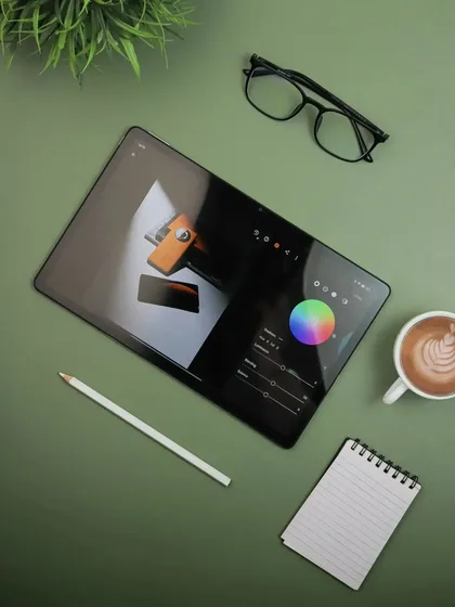 A flatlay photograph featuring the Realme Pad 2. This shot is designed to show the product in a creative, everyday context, using color theory and composition to create an aesthetically pleasing image for social media.
