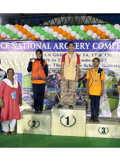The official winners' podium at the CISCE National Archery Competition, with our student proudly taking the silver medal spot for the Under-14 girls category.