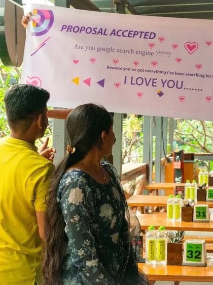This is the moment it all leads to. After a surprise flashmob, the "Proposal Accepted" banner is revealed, capturing the pure joy and emotion of the couple as they start their new journey together.
