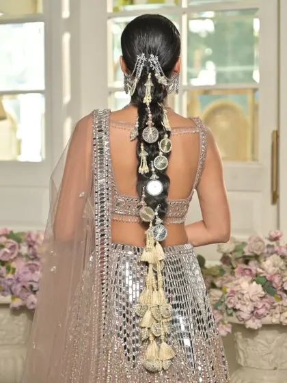 Another angle of the accessorized bubble braid, showcasing the intricate placement of each charm. The style is clean, structured, and perfect for highlighting detailed hair jewelry.