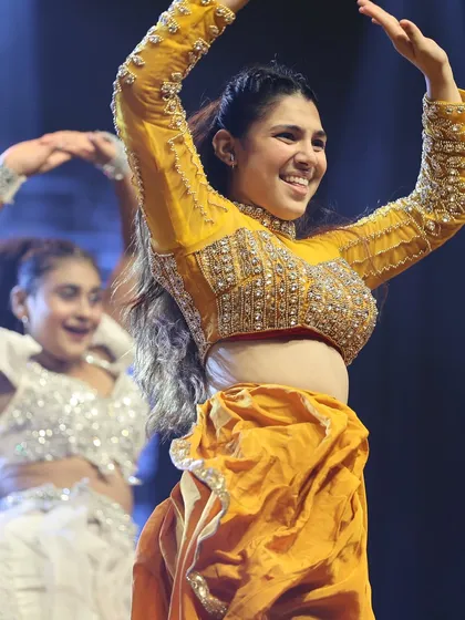 Every student deserves their moment in the spotlight. Our annual showcase, RUH, is a grand production where our dancers perform on a professional stage, celebrating their hard work and passion.