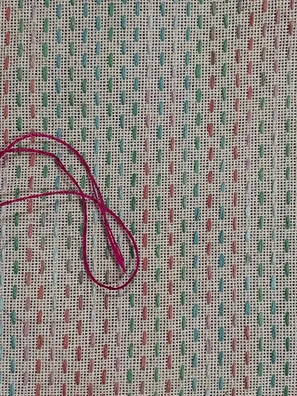 This piece, stitched with variegated thread, was intended to be a spectacle case or mobile pouch. The pattern is a blend of Sashiko and Kasuti styles.