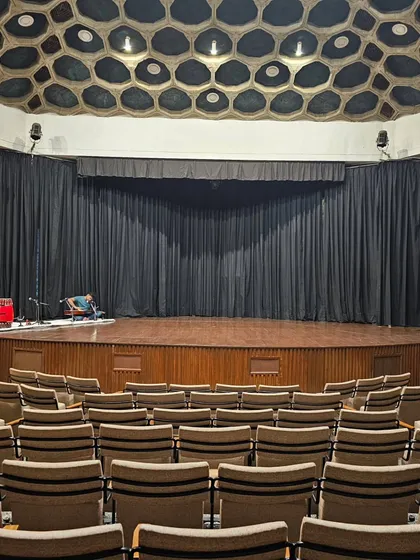 A view of the stage at the India International Centre in Delhi, with the musicians set up for the performance. The auditorium itself, with its unique honeycomb ceiling, has a wonderful atmosphere.