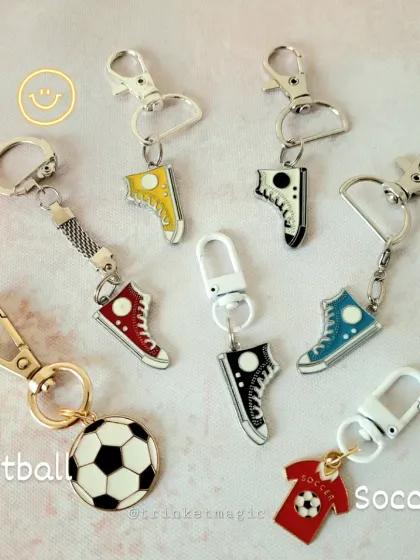 For the sports and sneaker fans, this collection of keychains includes a football, a soccer jersey, and colorful sneaker charms.