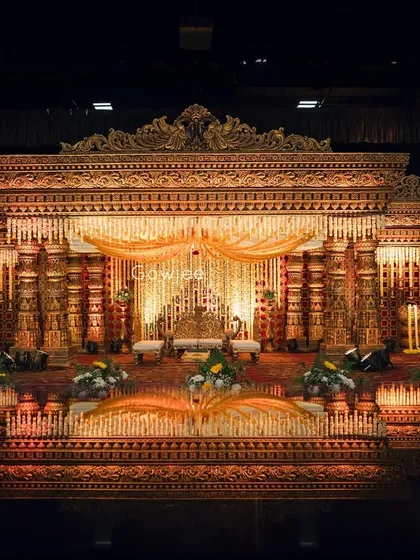 This is where I bring the grandeur of traditional South Indian temple architecture to life. The intricate details, warm lighting, and majestic scale of this mandap created an unforgettable royal wedding experience.