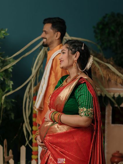 A candid side-profile shot capturing the couple's happy anticipation.