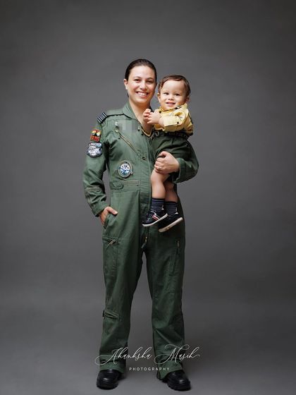 A beautiful portrait of mother and son from the Airforce family series. Her pride and his happiness are beautifully captured in this special moment.