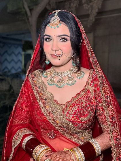 A close-up of Parul's bridal makeup. The focus is on creating a look that is both traditional and feels modern and fresh.