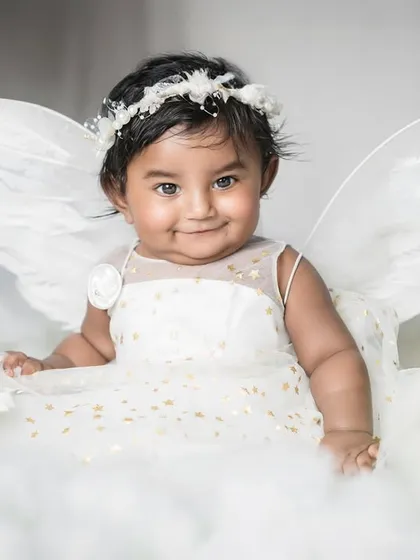 A little angel sent from above. I design these fine art newborn sessions with dreamy themes like this 'angel in the clouds' setup, creating a magical and timeless portrait of your baby's pure innocence.
