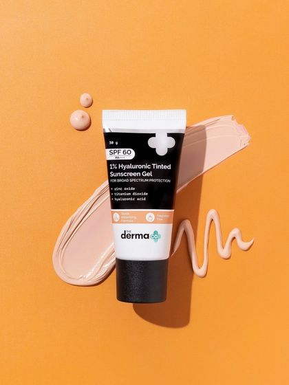 A variation of the texture flatlay, this time with the product standing upright. The combination of the tube, a perfect smear, and a few drops gives the customer a complete picture of the product's consistency and color.