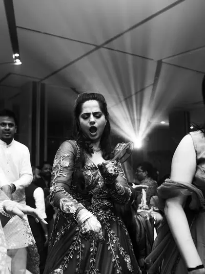 Candid moments of guests singing and dancing their hearts out on the dance floor.