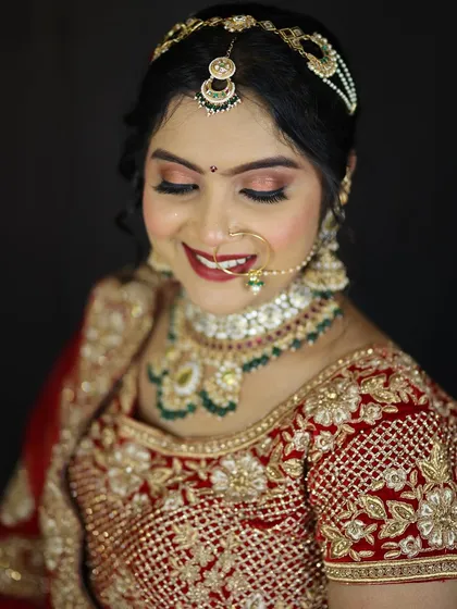 Another beautiful shot of the bride, showing how the makeup looks from a different angle. The smile says it all.