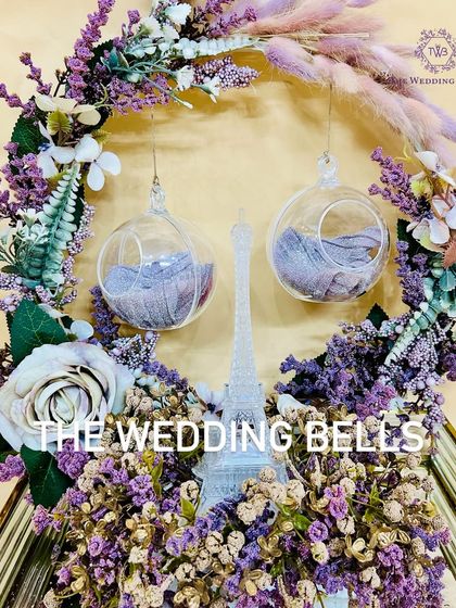 A close-up of our Parisian dream ring platter. The crystal Eiffel Tower and hanging glass orbs for the rings create a magical effect.