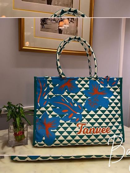 This blue and green geometric print tote bag is a modern and eye-catching design.