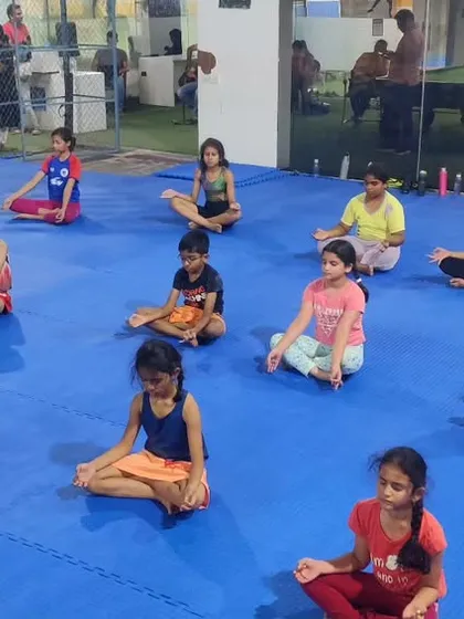 A wider view of our meditation session. We believe in training both the body and the mind for a holistic approach to gymnastics.