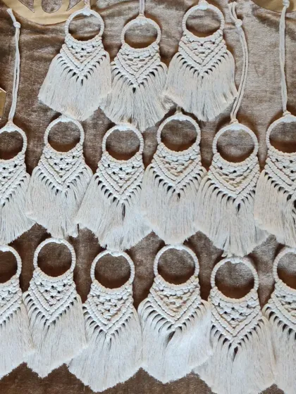 Simple, elegant, and full of boho charm. These white macrame hangings are perfect as wedding favors, festive gifting, or car charms. We can create these in large quantities for your event.