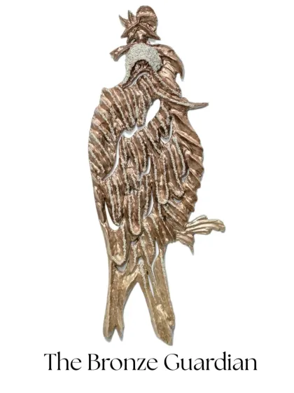 "The Bronze Guardian," a symbol of protection, dignity, and leadership. Sculpted in a bronze tone with upcycled paper and illuminated with diamonds, it embodies unity and resilience.