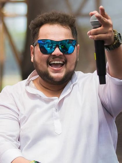 On the mic and feeling the love from the massive Holi festival crowd. My goal is to make sure every single person feels connected to the music.