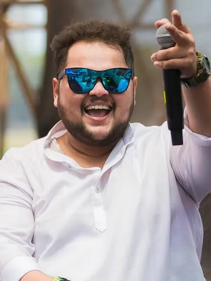 On the mic and feeling the love from the massive Holi festival crowd. My goal is to make sure every single person feels connected to the music.
