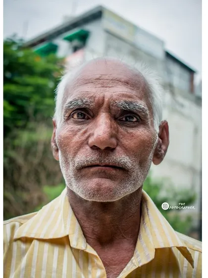 A tight, centered portrait that puts all the focus on the subject's eyes. This kind of shot is about creating a direct connection between the person in the photo and the person looking at it.